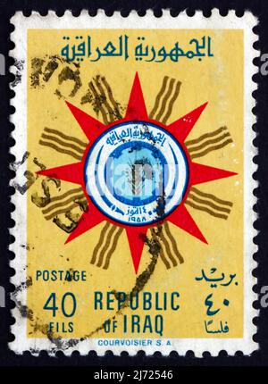 IRAQ - CIRCA 1959: a stamp printed in the Iraq shows Emblem of Republic, circa 1959 Stock Photo