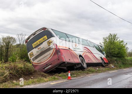 Bauravilla, West Cork, Ireland. 5th May, 2022. A Bus Eireann school bus has gone off the road on the R593 Skibbereen to Drimoleague Road at Bauravilla. The bus was transporting children home from Skibbereen Community School and there were no injuries. Credit: AG News/Alamy Live News. Stock Photo