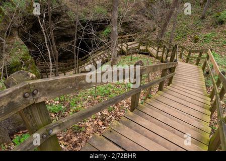 Wooden walkway leading to Dancehall Cave at Maquoketa Caves State Park, Iowa. Stock Photo
