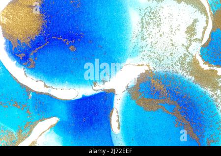 Alcohol-based ink texture in blue tones with gold. Copy space. Stock Photo