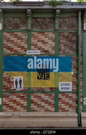 Flag of Paris painted on brick wall Stock Photo - Alamy