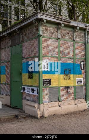 Ukrainian flag painted on a brick wall Stock Photo