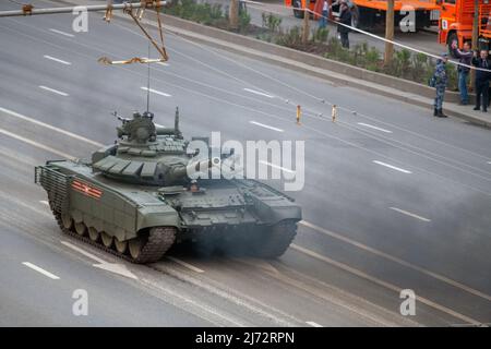 Russian T-14 Armata Main Battle Tank (MBT) in cloud of heavy smoke at  Victory Parade in Moscow Stock Photo