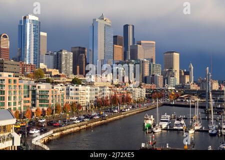 The sun peaks through the clouds in Seattle Stock Photo