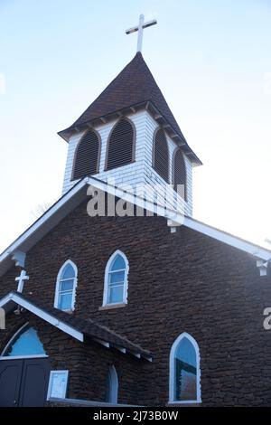Steeple of Our Lady of Guadalupe Chapel in Flagstaff, Arizona. Stock Photo