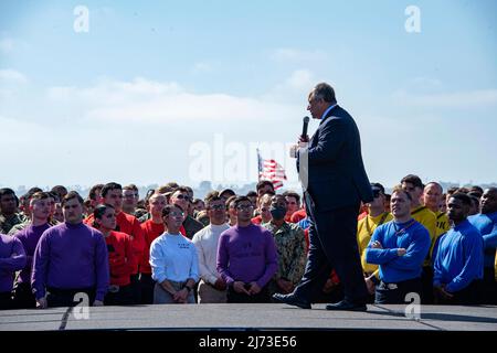 San Diego, United States. 04 May, 2022. U.S. Secretary of the Navy Carlos Del Toro addresses an All Hands meeting on the flight deck of Nimitz-class aircraft carrier USS Carl Vinson, May 4, 2022 in San Diego, California.  Credit: MCs Analice Baker/US Navy/Alamy Live News Stock Photo