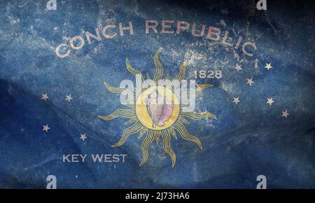 Top view of retro flag of Key West, Florida, untied states of America with grunge texture. USA patriot and travel concept. no flagpole. Plane design, Stock Photo