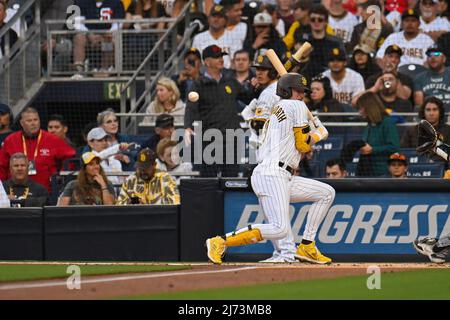 May 05, 2022: San Diego Padres second baseman Jake Cronenworth (9) avoids a  pitch during a MLB baseball game between the Miami Marlins and the San  Diego Padres at Petco Park in