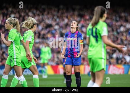 Alexia Putellas (C) of FC Barcelona, Joelle Wedemeyer (R) and Kathrin-Julia Hendrich (L) of VfL Wolfsburg Women seen in action during the UEFA Women's Champions League match between FC Barcelona Femeni and VfL Wolfsburg Women at Camp Nou. Final score; FC Barcelona Femeni 5:1 VfL Wolfsburg Women Stock Photo