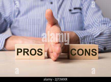 Pros and cons comparison concept. Business pluses vs against minuses comparing. High quality photo Stock Photo