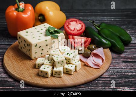 Mexican Chihuahua cheese with jalapeño or mennonite spicy cheese from Mexico Latin America Stock Photo