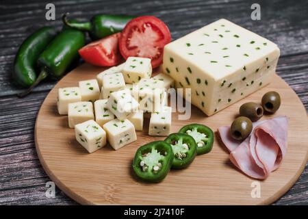 Mexican Chihuahua cheese with jalapeño or mennonite spicy cheese from Mexico Latin America Stock Photo