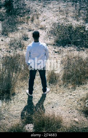 High angle view of man and woman standing in the field Stock Photo