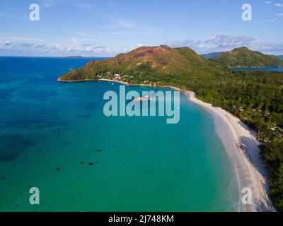 Praslin Seychelles tropical island with withe beaches and palm trees, the beach of Anse Volbert Seychelles.  Stock Photo