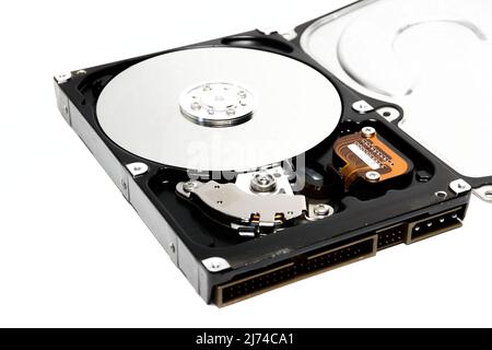 Open hard drive isolated on white background. Computer storage device. Computer hard drive HDD. computer memory. Stock Photo