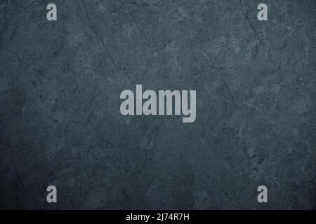 Dark gloomy blue and black slate background or texture Stock Photo