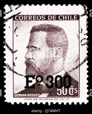 MOSCOW, RUSSIA - MARCH 27, 2022: Postage stamp printed in Chile shows German Riesco (1854-1916) surcharged, Presidents serie, circa 1974 Stock Photo