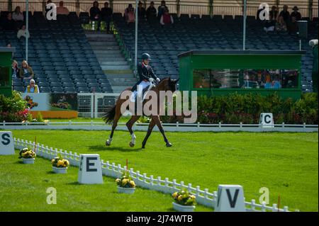 Badminton, Gloucestershire, UK. 6th May 2022. Laura Collett and London 52 representing Great Britain move into the lead during the Dressage Phase on Day 2 of the 2022 Badminton Horse Trials presented by MARS at Badminton House near Bristol, Gloucestershire, England, United Kingdom. Jonathan Clarke / Alamy Live News