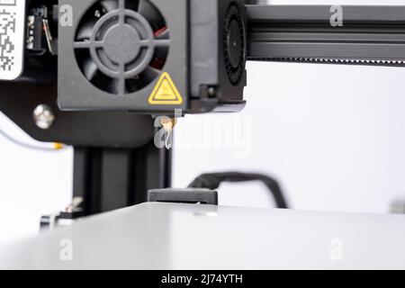 3D printer board, close-up to 3D printer, macro-shot of filament, printing and production concept, industrial machine, technological device, flat view Stock Photo