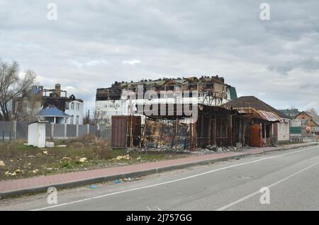 Myla village, Kyiv region, Ukraine - Apr 11, 2022: Buildings and houses near the Zhytomyr highway were destroyed and burned by russian occupiers. Stock Photo