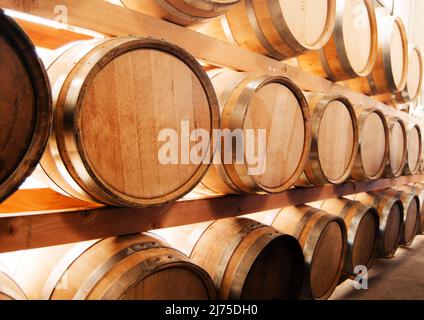 wine barrels in cellar Stock Photo