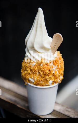 Vanilla ice cream topped with cereal Stock Photo