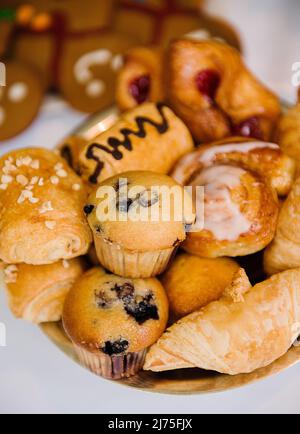 Bowl of mixed pastries and muffins Stock Photo