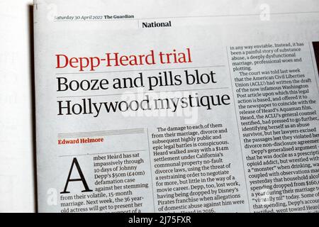 'Depp-Heard trial Booze and pills blot Hollywood mystique' Guardian newspaper headline court case article April 2022 London England UK Great Britain Stock Photo