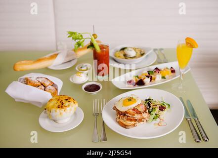 Brunch with French dishes and two drinks Stock Photo