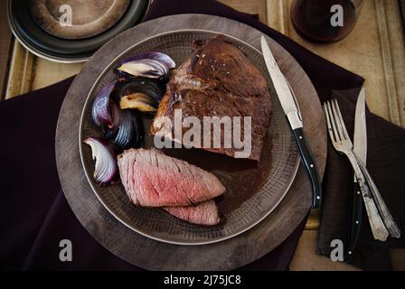 London broil with red onions Stock Photo