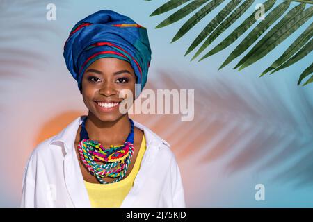 Photo of zulu lady wear national accessories necklace look smile under green forest isolated on colored background Stock Photo