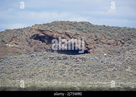 A view of Fort Rock Cave, near Fort Rock State Park in Oregon. The cave was excavated in 1938 inside were several sandals made of sagebrush dating bac Stock Photo