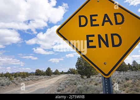 A dead end roadsign on a country gravel road in the Oregon Outback near Fort Rock, Oregon. Stock Photo