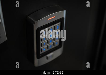 Photo of security systems against thieves.Photos of an electronic engineer fixing a camera and a radar system.Photo of a keypad.Photo of a CCTV Stock Photo