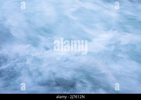 Clear water and traveling spray at the Rissbach in the Karwendel mountains in the Eng, well suited as a background Stock Photo