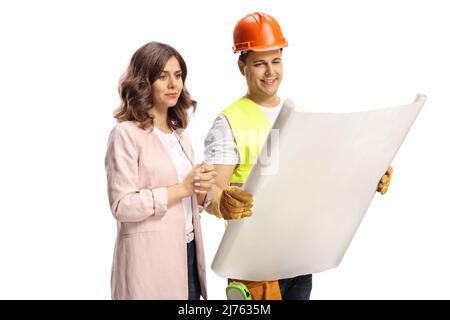 Engineer with a helmet showing a plan to a young woman isolated on white background Stock Photo