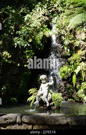 Cherub Sculpture in the Jardim Tropical Monte Palace in Monte, Funchal on Madeira island, Portugal, Europe. Photo by Matheisl Stock Photo