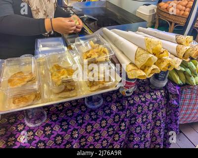 Roti, sale of different roti varieties, typical Thai dessert, Asiatique The Riverfront, entertainment mile, night market, river Chao Praya, Bangkok, Thailand, Asia Stock Photo