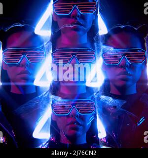 Neon multi-composition of young cyber woman in flashing LED goggles in neon light Stock Photo