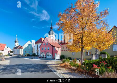 Catholic, and Protestant Bartholomew Church, town hall, house front, facade, village view, autumn, Rödelsee, Franconia, Bavaria, Germany, Europe Stock Photo