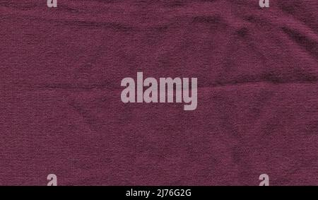 Purple plum colored wool sweater texture. Angora cozy purple plum knitted fabric texture. Stock Photo