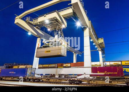 Vienna, moving gantry cranes in container terminal of port Freudenau, company WienCont, railway line, transshipment road to rail and vice versa, container in 02. district Leopoldstadt, Austria Stock Photo