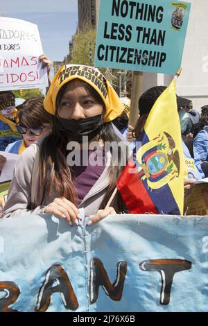 Hispanic demonstrators participate on the traditional May Day Rallies for workers at Washington Square Park in New York City demanding citizenship for all people that work and support American society. Stock Photo