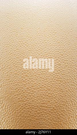 Macro shot of beer foam structure. Mass of very small bubbles in beer drink. Stock Photo