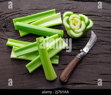 Pile of celery ribs isolated on white background. Stock Photo