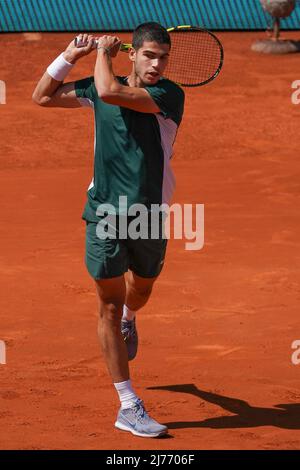 Spanish Carlos Alcaraz plays against Rafael Nadal during their 2022 ATP Tour Madrid Open tennis tournament singles quarter-finals match at the Caja Magica in Madrid.Carlos Alcaraz beats Rafael Nadal (6-2,1-6,3-6)