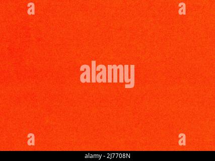 High quality scan of an fine grain fiber smooth uncoated paper texture red, bright, neon orange colored background with copy space for text material m Stock Photo