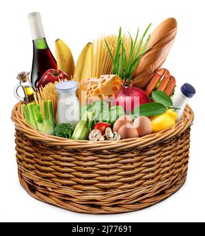 Food basket. Vast of different vegetables and products in the wicker basket on white background. Stock Photo