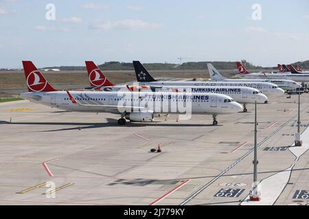 ISTANBUL, TURKEY - OCTOBER 05, 2021: Airplanes in parking position in Istanbul International Airport. Stock Photo