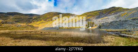 Isolated  and beautiful Llyn Cwmorthin, in a disused slate quarry, Blaenau Ffestiniog, Gwynedd, North Wales Stock Photo